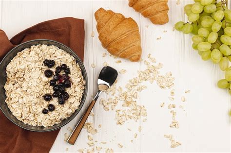 Free Photo | Oatmeal porridge bowl with jam