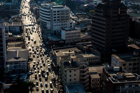 Explosions rock Zimbabwe capital in apparent military coup