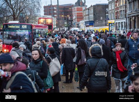 Crowds of commuters at Stratford Underground station this morning Stock ...