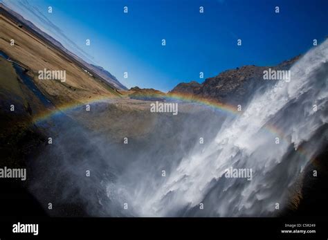 Seljalandsfoss waterfall with rainbow, Seljalandsfoss, Iceland Stock ...