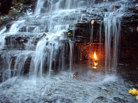 Eternal Flame Falls, New York. A flame fueled by natural gases burns ...