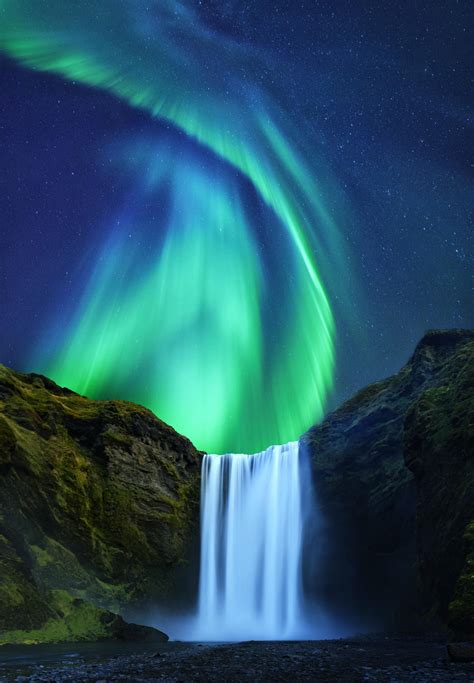 Aurora Borealis over Skogafoss in Iceland... | Nature pictures, Nature ...