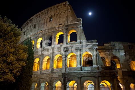 Full Moon Over Roman Colosseum At Night Stock Photo | Royalty-Free ...