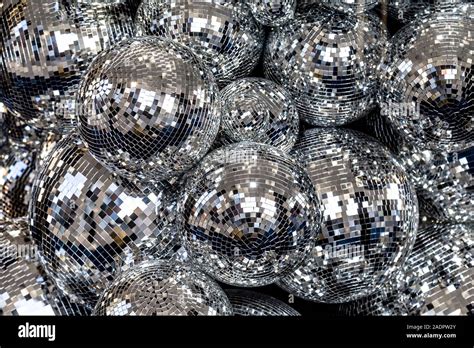 Silver disco balls background Stock Photo - Alamy