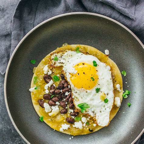 Huevos rancheros with salsa verde and black beans - savory tooth