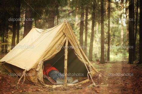 Old tent in the autumn forest, home for adventure and travel — Stock ...