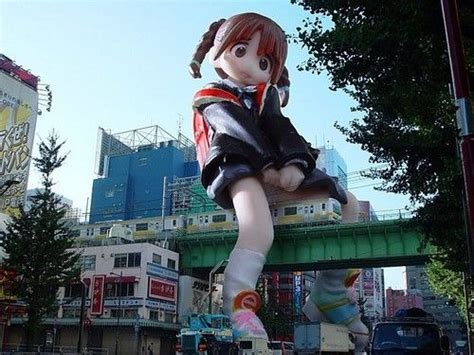 The train goes under her skirt! Only in Japan would you see this kind ...