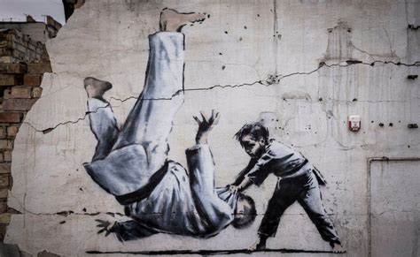 Banksy unveils Ukraine gymnast mural on building shelled by Russia ...