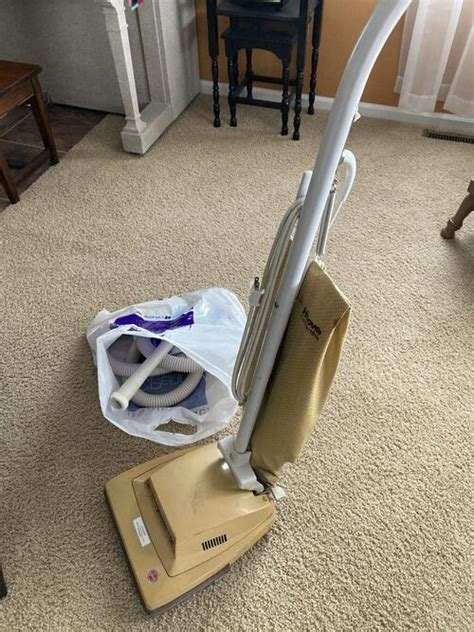 Hoover upright vacuum with hose attachments $10 | Mandan, ND