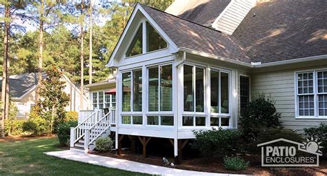 Four Season white vinyl sunroom | Four seasons room, Porch addition ...