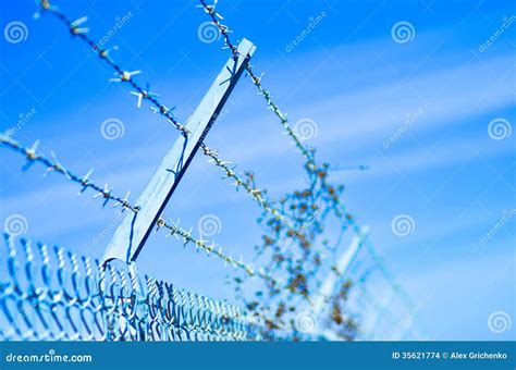 Barb wire fence stock photo. Image of industrial, dangerous - 35621774