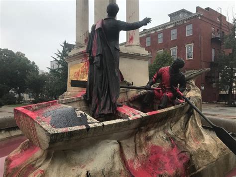 Francis Scott Key Monument splashed with red paint and spray painted ...