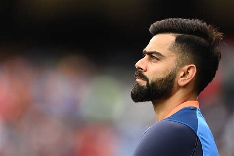 Virat Kohli looks on during India's warm-up | ESPNcricinfo.com