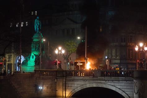 Buses and trams burned in Dublin riots after children injured in knife ...