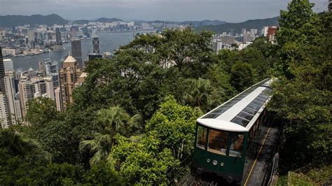 Hong Kong's Peak Tram reopens after 14 months - BBC News