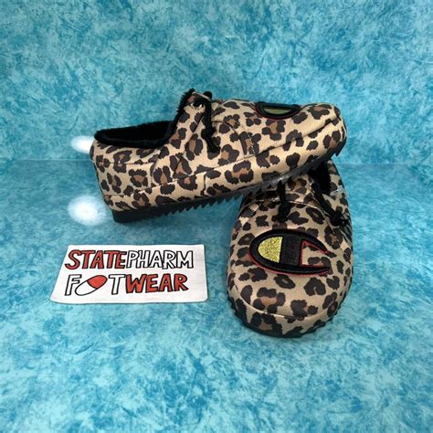 Brand new Champion Slippers 'Animal Print'. Size 6... - Depop