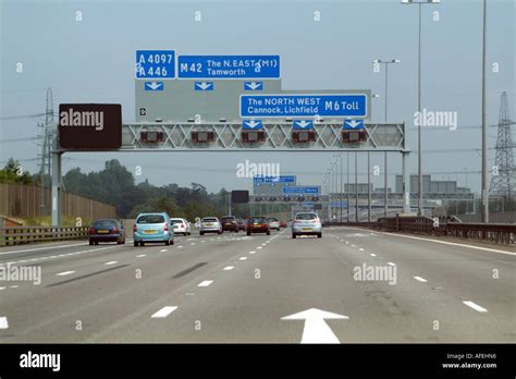 M6 motorway near Birmingham central England UK. Road signs for the ...