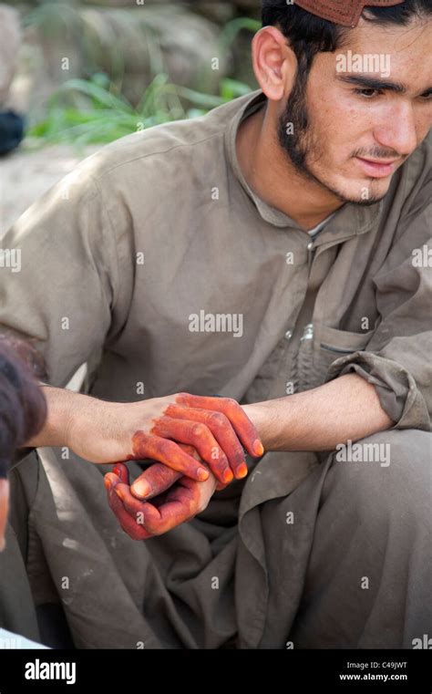 Man with hennaed hands in Helmand Afghanistan Stock Photo - Alamy