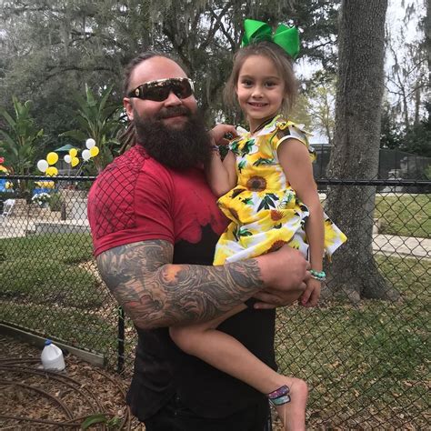 WWE Superstar Bray Wyatt (Windham Rotunda) holding his youngest ...