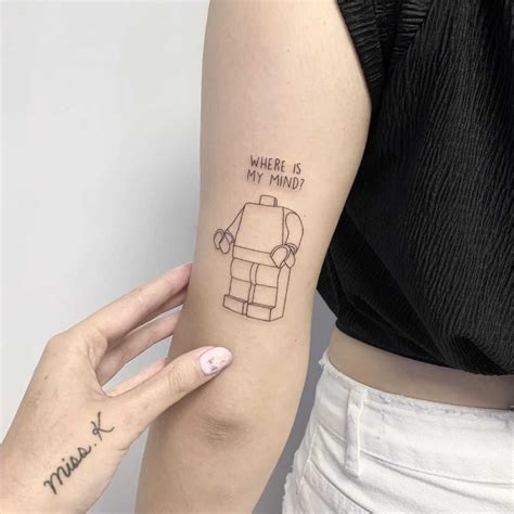 Lego man by Sara Kori - Tattoogrid.net