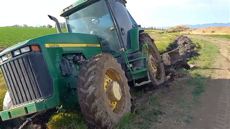 The tractor was stuck in the mud - YouTube