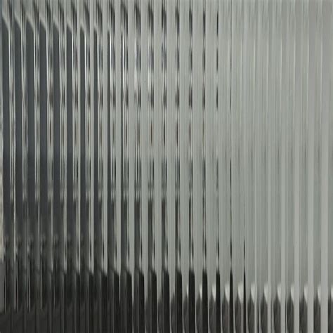 a close up view of a shiny metal surface with vertical lines on the ...