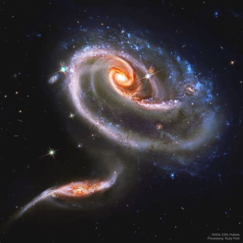 APOD: 2019 November 20 - Arp 273: Battling Galaxies from Hubble