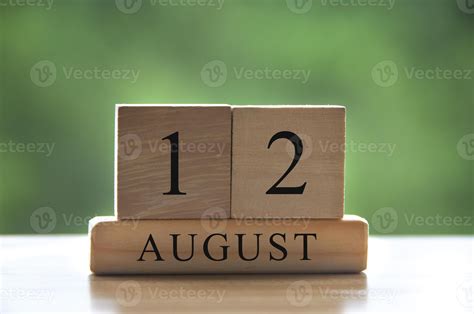 August 12 calendar date text on wooden blocks with blurred background ...