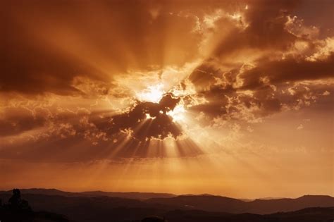 Premium Photo | Sky with clouds and sun rays. Sunset over mountains ...