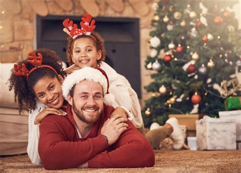 Premium Photo | Christmas portrait and happy family in house on floor ...