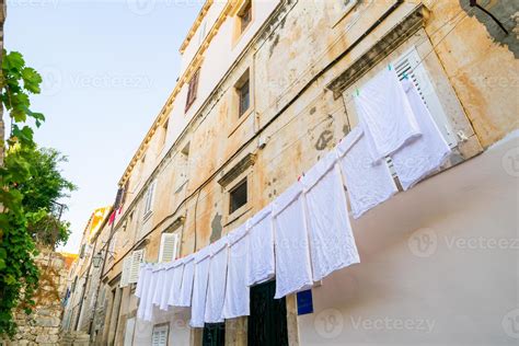 hanging white clothes 4877140 Stock Photo at Vecteezy