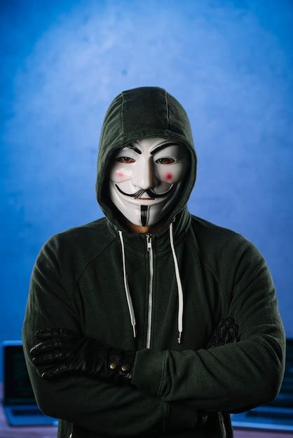 Hacker with anonymous mask | Free Photo