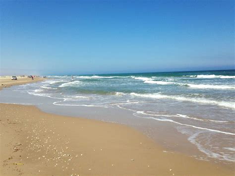 Wade and sunbathe at these Texas beaches this summer