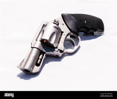 A stainless snub nosed 357 magnum revolver on a white background Stock ...