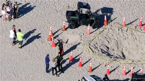 Child dies in sand hole, another hospitalized after hole they dug in ...