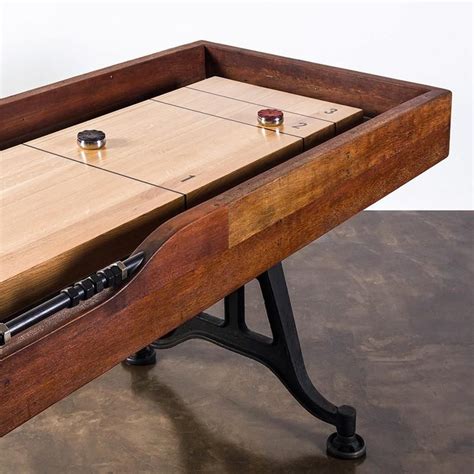 The District Eight shuffleboard table adheres to the design philosophy ...