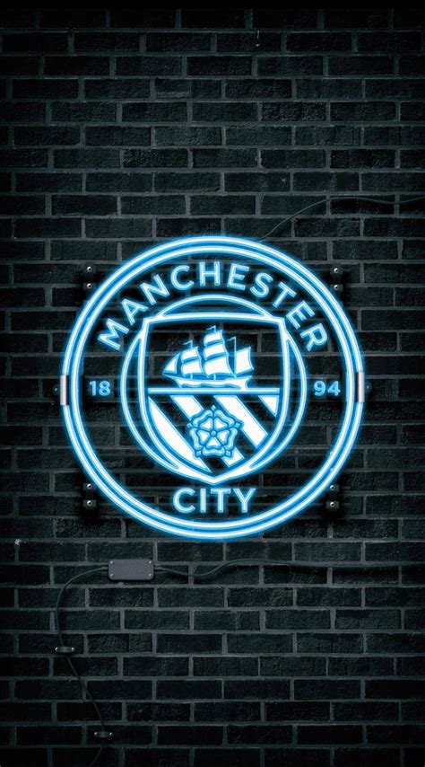 Download Manchester City 4k Neon Blue Logo Wallpaper | Wallpapers.com