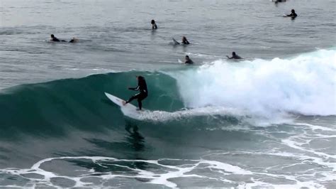 Surfing at Huntington Beach Pier - YouTube