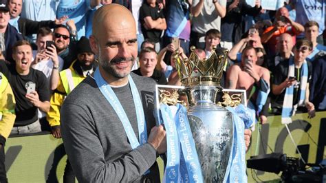 How many trophies has Pep Guardiola won?