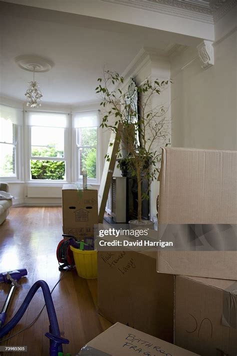 Cardboard Boxes And Furniture Packed Up For Moving House High-Res Stock ...