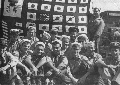 [Photo] Crew of USS Snook holding up the submarine's scorecard, Dec ...