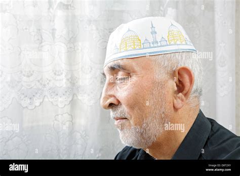 Senior man in religious hat Stock Photo - Alamy