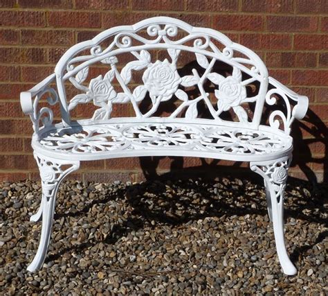 Cute white, iron-wrought bench with rose detailing! | Cast iron garden ...