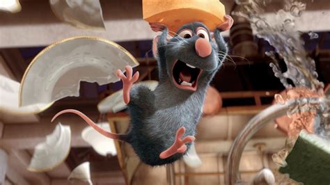 a cartoon mouse is jumping in the air with a piece of cheese on his head