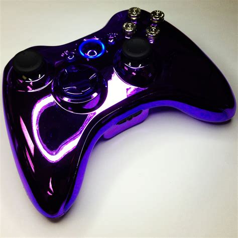 A purple chrome custom modded Xbox 360 controller with nickel bullet ...