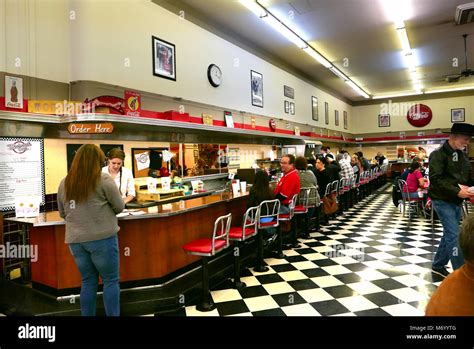 A 74 foot lunch counter at an F W Woolworth opened in 1950. The store ...