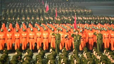 North Korea’s Kim Jong Un stages military parade