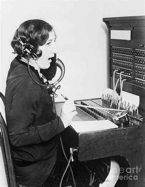 Telephone Operator At Switchboard by Bettmann