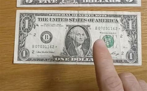 Man reveals hidden meaning of tiny star on certain bills