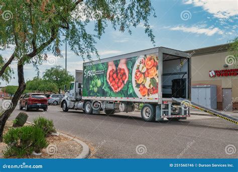 A Sysco Truck Driver Unloads His Truck at a Restaurant Editorial Photo ...